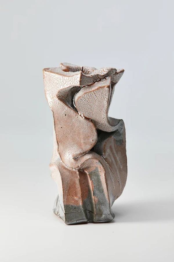 Crackled ceramic surface shaped by earth and fire